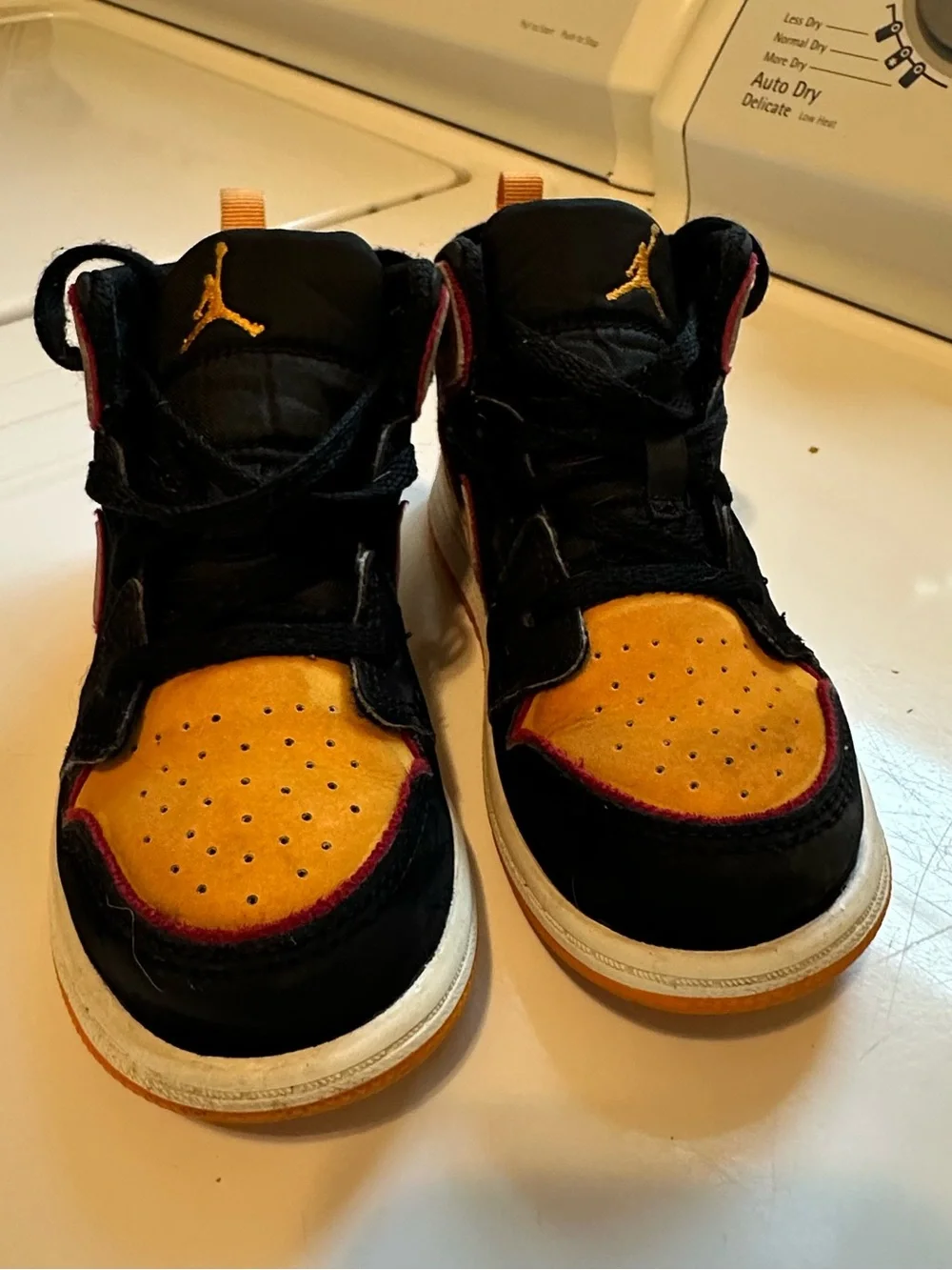 Nike Air Jordan 1 Mid-Top Basketball Shoes in Black and Yellow Vivid Orange 10